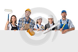 Group of industrial workers with banner