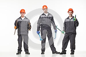 Group of industrial workers. Isolated over white background