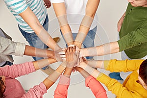 Group of international people with hands together
