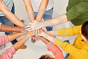 Group of international people with hands together