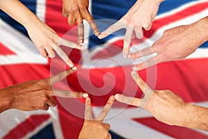 Group of international people showing peace sign