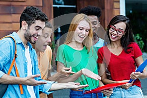 Group of international students is happy about good grades