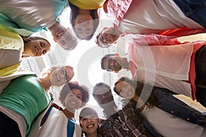 Group of international students standing in circle