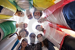 Group of international students standing in circle