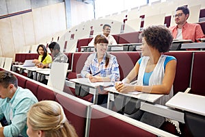 Group of international students talking on lecture