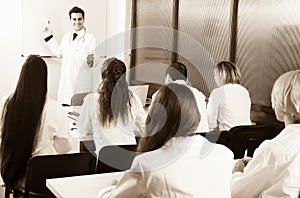 Interns at lecture at university