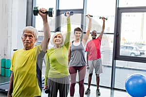 Group of interracial senior people exercising