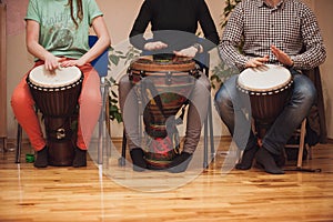 Group of Jambe drummers playing photo