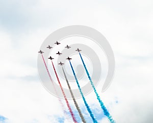 Group of jet air planes performing a display..