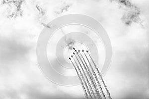 Group of jet air planes performing a display..