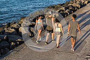 Group of joggers talking during workout