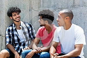 Group of joking african american and caucasian hipster man