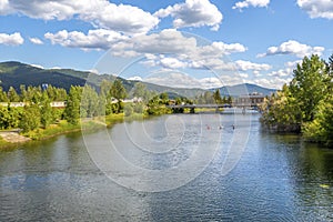 A group of kayakers enjoy a beautiful summer day on Sand Creek River and Lake Pend Oreille, Sandpoint Idaho