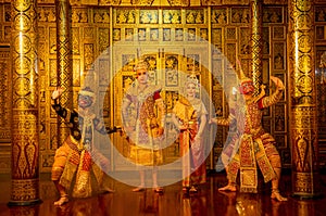 Group of Khon or traditional Thai classic masked from the Ramakien characters stand together with action of traditional dance with