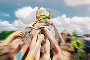 Group of Kids Celebrating Sport Success Outdoor