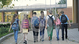 Group of kids go to school together