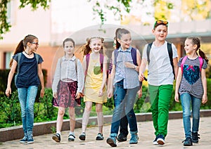 Group of kids going to school together.