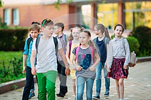 Group of kids going to school together.