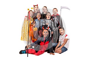 Group of kids in Halloween costumes