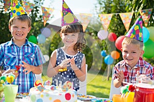 Group of kids having fun at birthday party