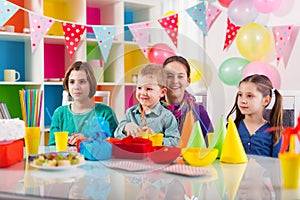 Group of kids having fun at birthday party