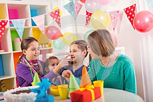 Group of kids having fun at birthday party