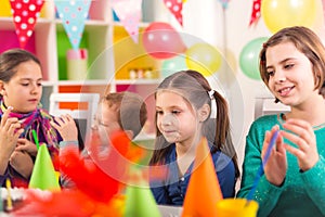 Group of kids having fun at birthday party