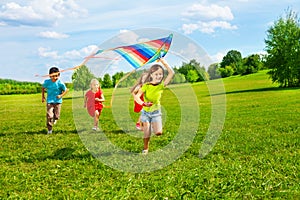 Group of kids with kite photo