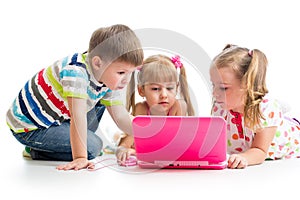 Group of kids looking at the laptop