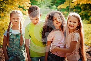 Group of Kids Playing Cheerful Park Outdoors. Children Friendship Concept