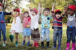 Group of kids school field trips learning outdoors botanic park photo