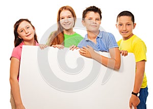 Group of kids show sign