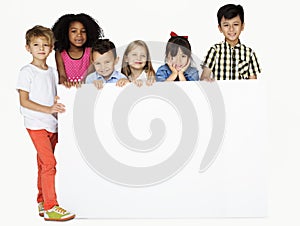 Group of Kids Showing Copyspace Board