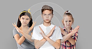 Group Of Kids Showing Stop Gesture With Crossed Hands, Collage