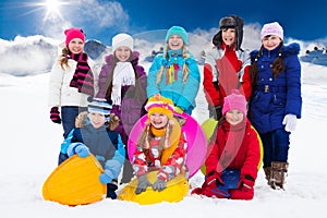 Group of kids with sleds