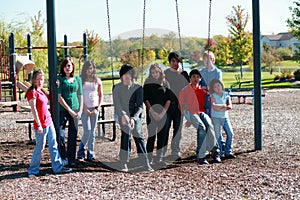 Group of kids on swingset