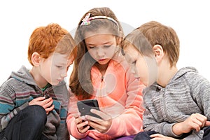 Group of kids using smartphone
