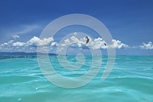 Group of kite surfers in the sea