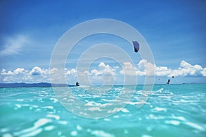 Group of kite surfers in the sea