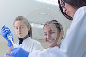 Group of  Laboratory scientists working at lab with test tubes, test or research in clinical laboratory.Science, chemistry,