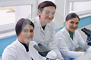 Group of  Laboratory scientists working at lab with test tubes, test or research in clinical laboratory.Science, chemistry,