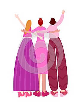 Group of ladies in pink cheering and hugging.