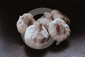 Group of large white garlic, hand-picked photo