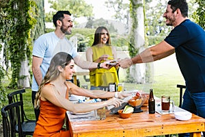 Group of latin friends eating mexican food in the restaurant terrace in Mexico Latin America