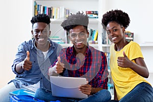 Group of laughing african american computer science students