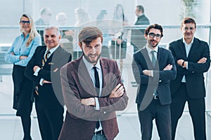 Group of leading experts standing in the office.