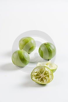 Group of lemons on white table