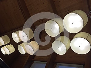 Group of light fixtures hanging at the ceiling
