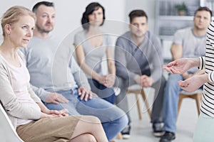 Group listening to woman