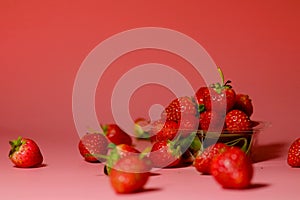 Group of little lovely sweet strawberry with pink background.